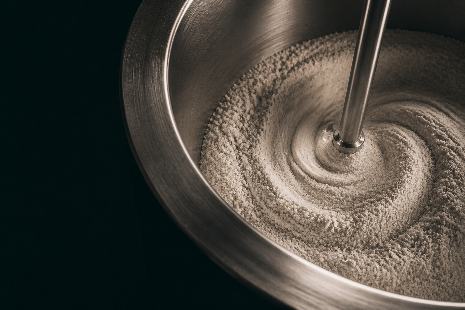 Mineral powder moving through stainless-steel equipment